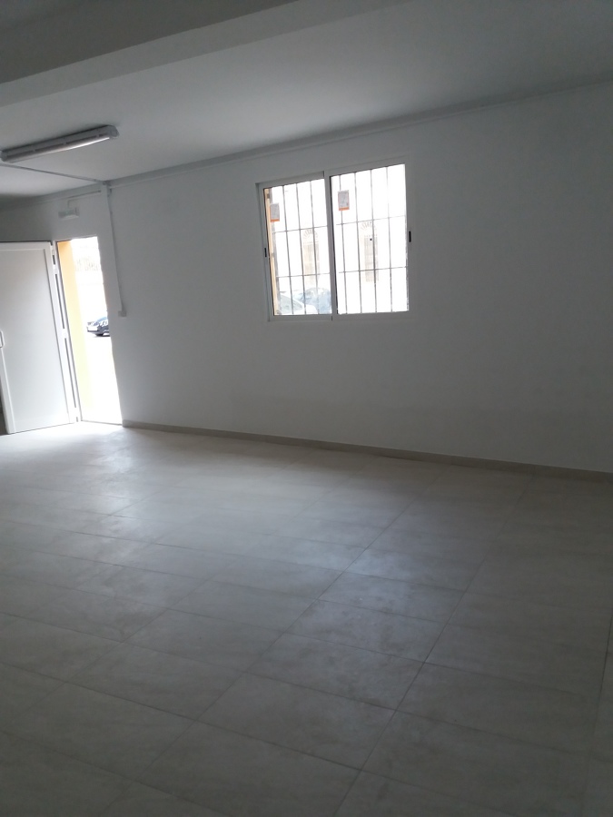 Colocación de suelo porcelanico y ventanas aluminio