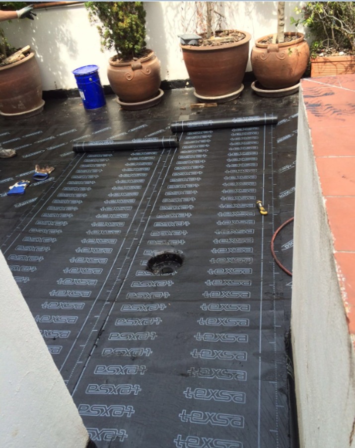 Colocación de tela asfáltica