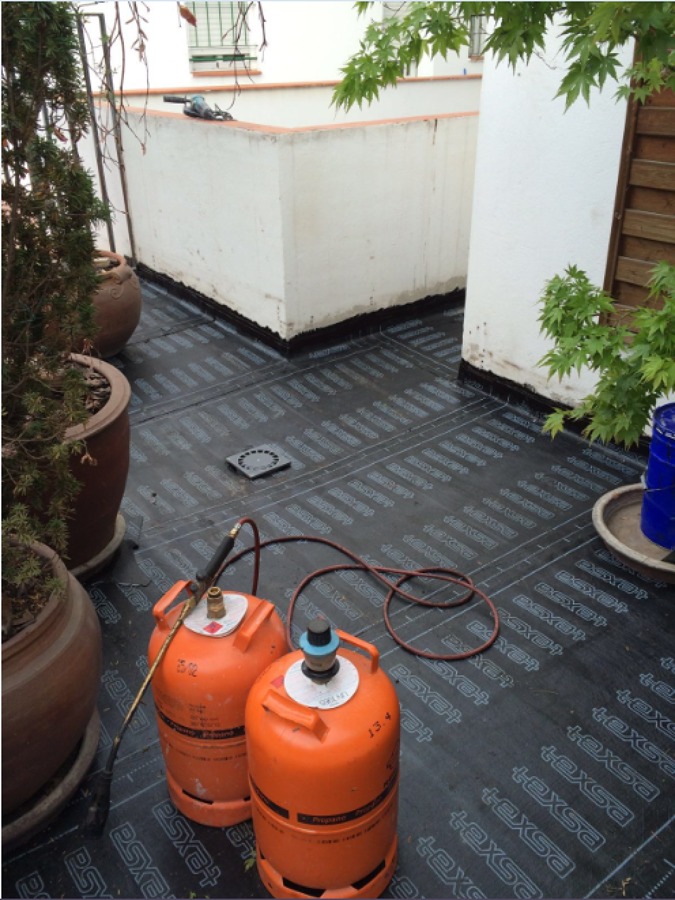 Colocación de tela asfáltica