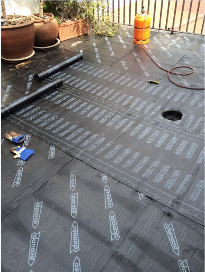 Colocación de tela asfáltica