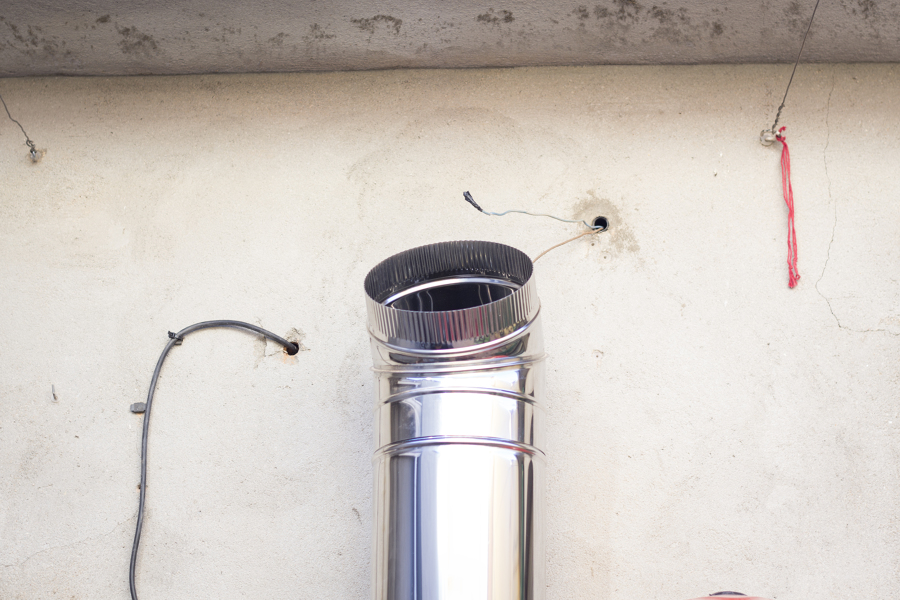 Colocación de tubo de salida de gases