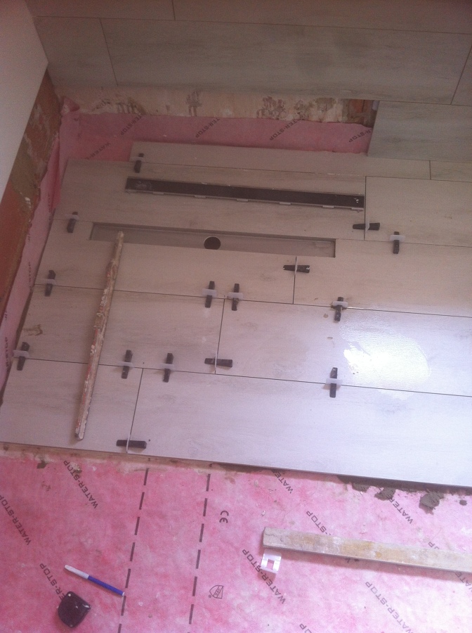 COLOCACION MANTA DE PLATO DUCHA PARA EVITAR FILTRACION AGUA