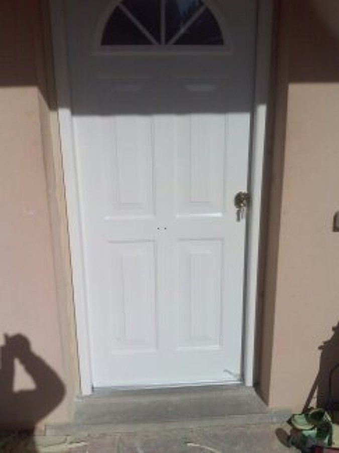 Colocación puerta de entrada