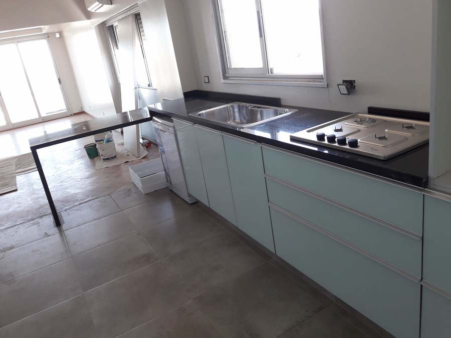 Colocación vitro de acero inoxidable y fregadero