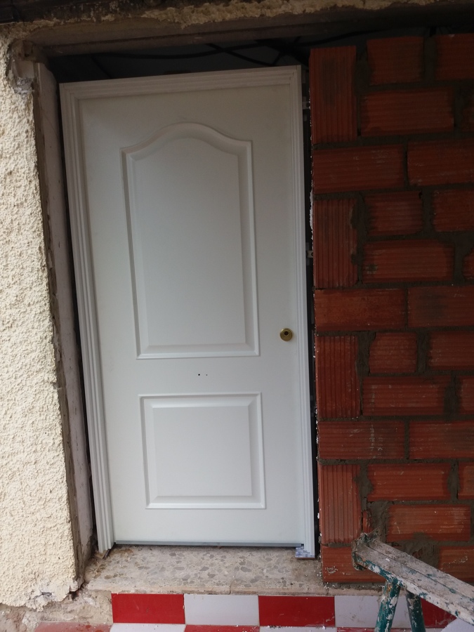 Colocación y abdicación de puerta