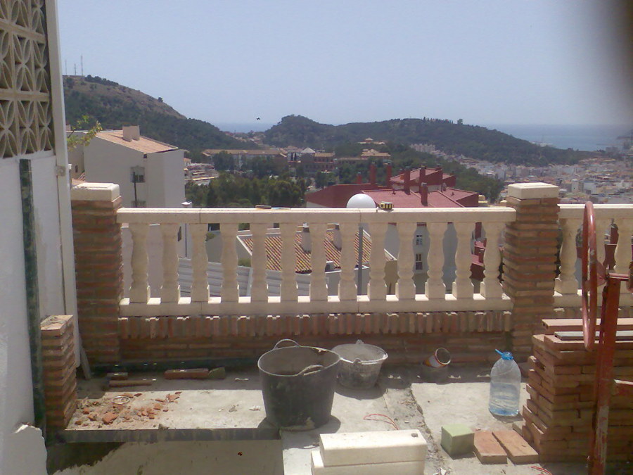 Colocando ladrillos viejos