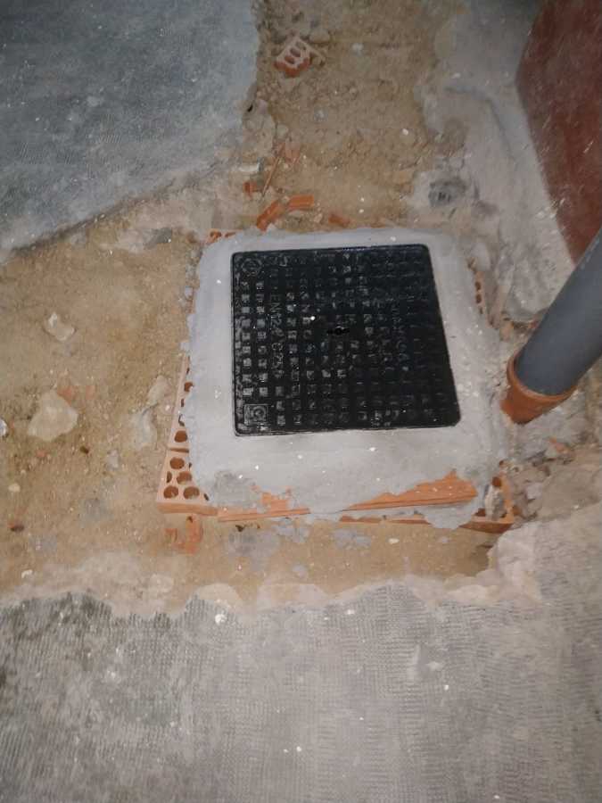 construccion de arqueta con tapa de hierro fundido