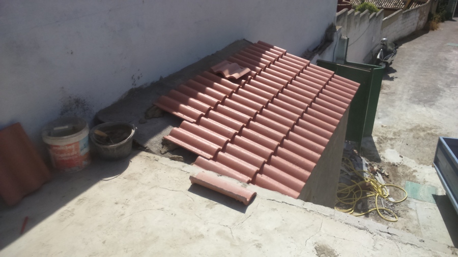 Construcción del tejado del Baño.