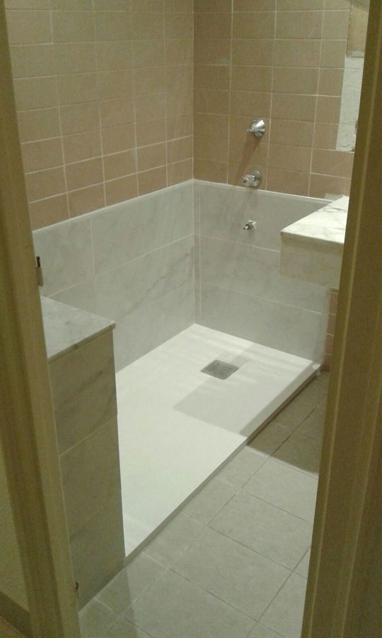 Conversión de bañera a plato de ducha extraplano sin gran reforma