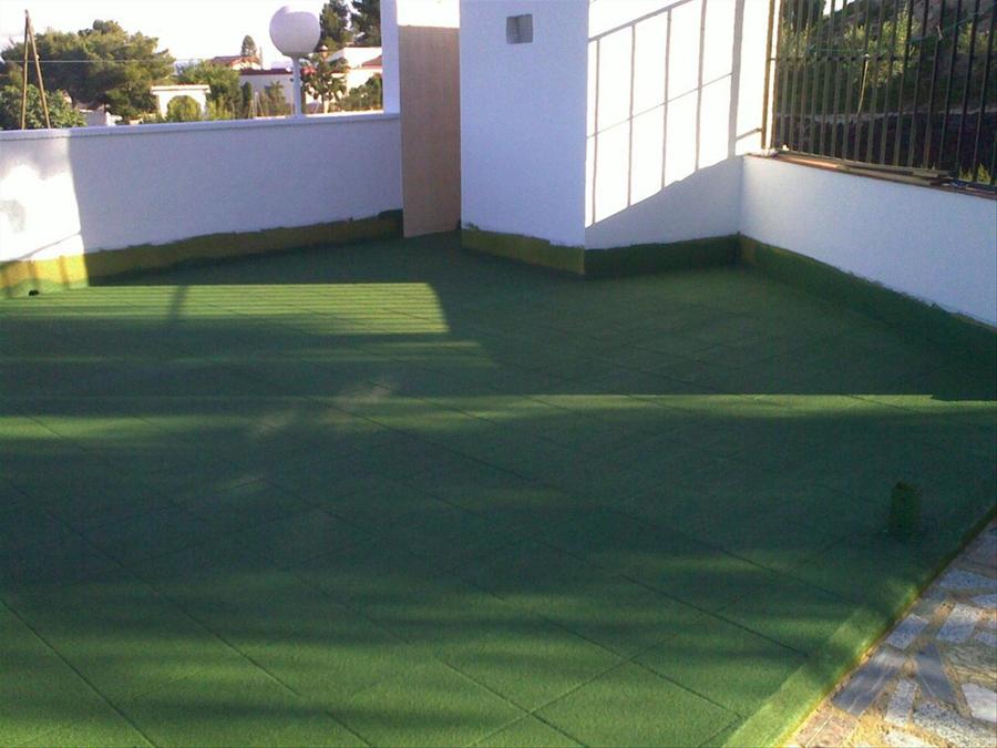 CORCHO PROYECTADO EN SUELO DE PISCINAS