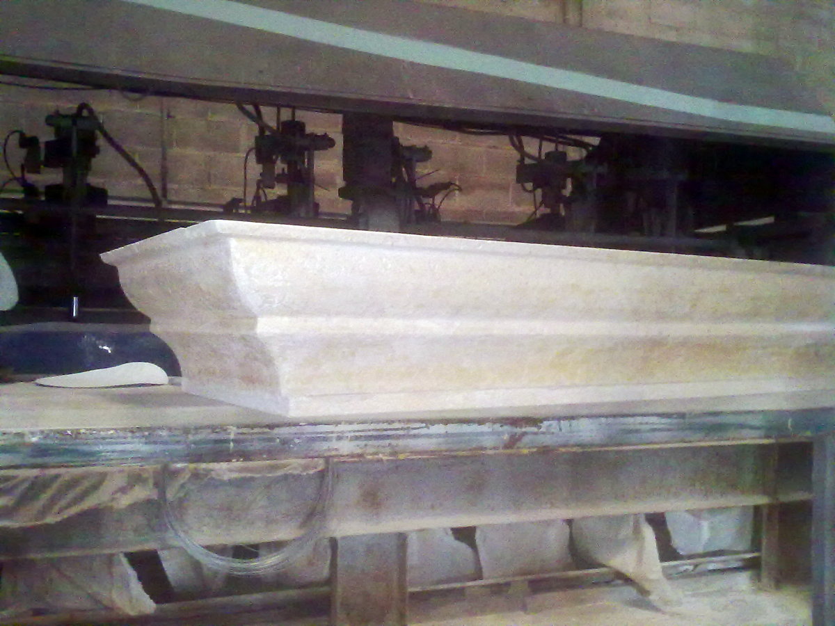 cornisa para fachada en piedra fosil