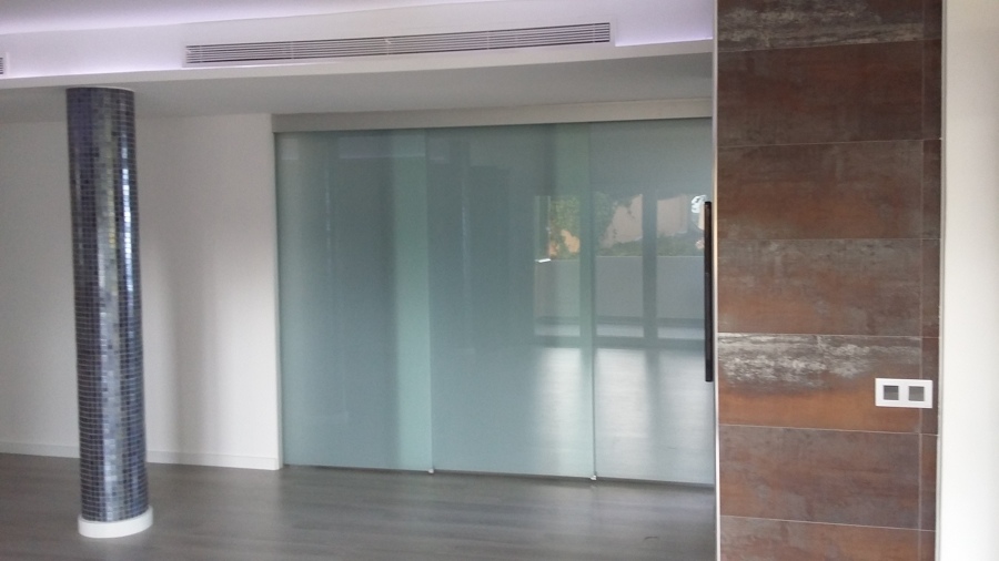 Corredera de cristal ácido