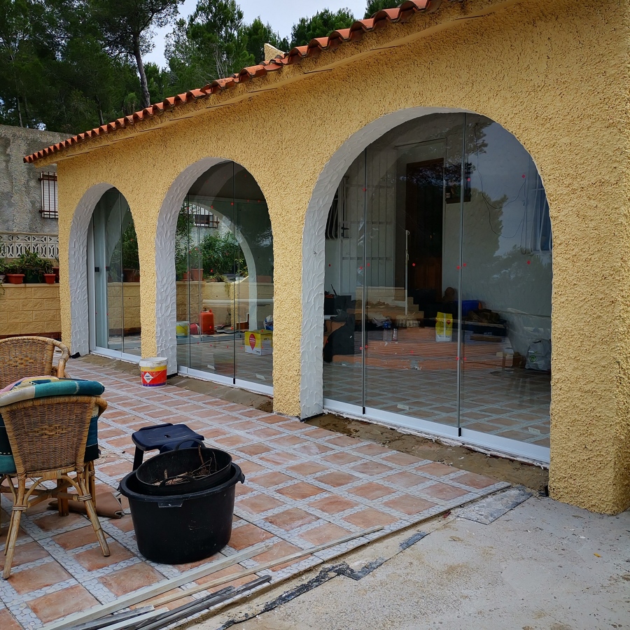 Corredera de cristal Cierre central