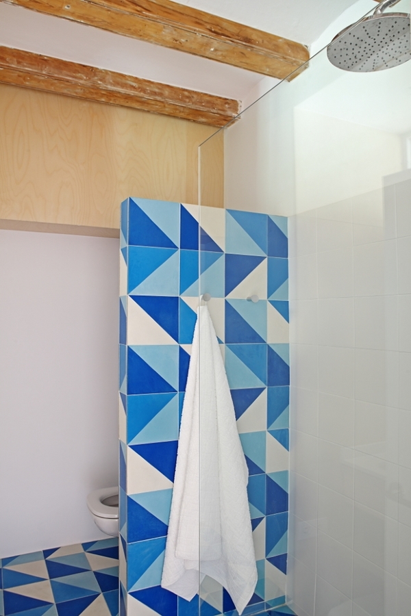 cuarto de baño con ducha de obra