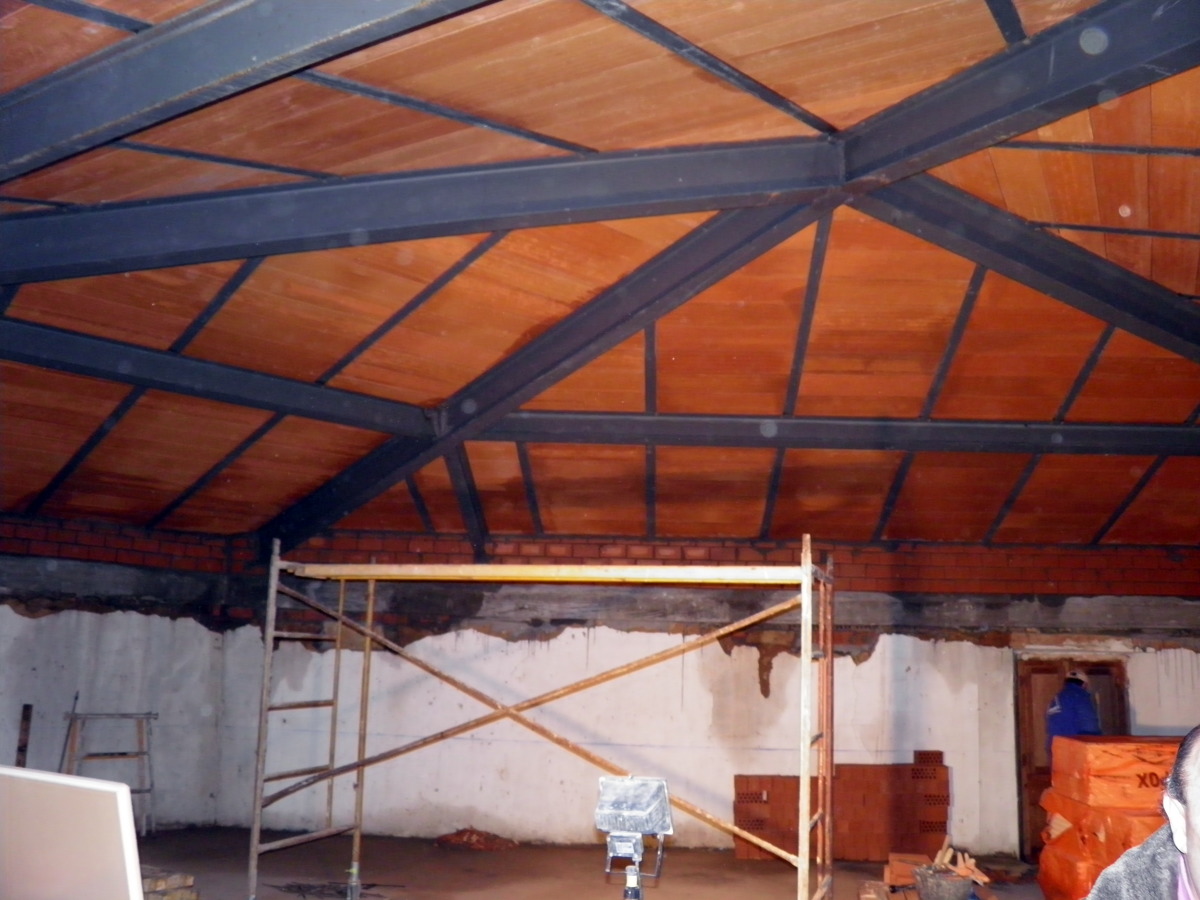 Cubierta metálica con rasillón cerámico + capa de compresión  + XPS + teja cerámica mixta