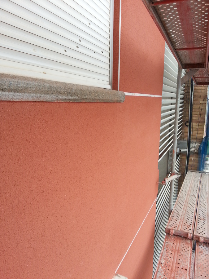 Detalle del acabo monocapa raspado