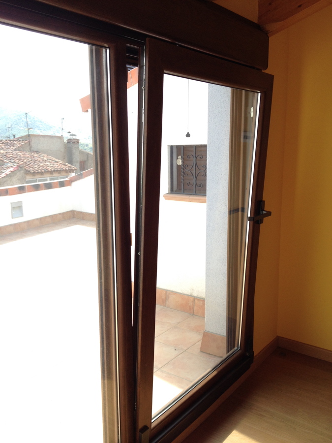 Detalle puerta oscilo-paralela