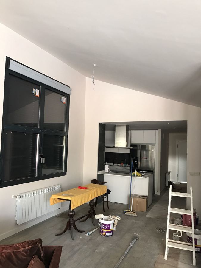 Detalle salón, cocina americana