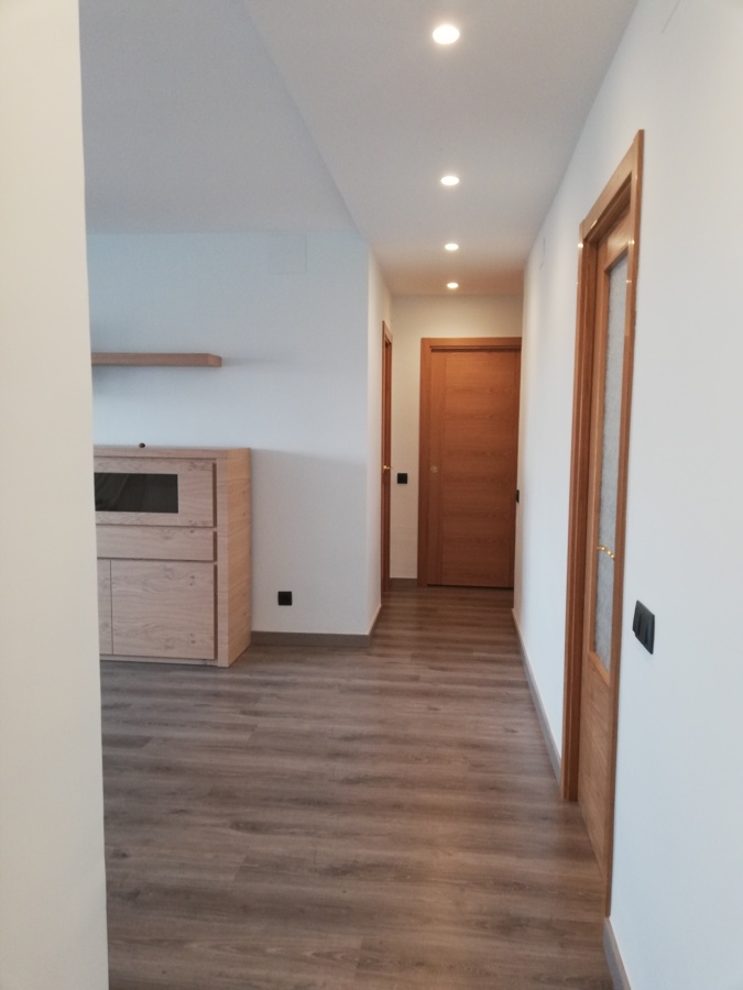 Distribuidor abierto a salón