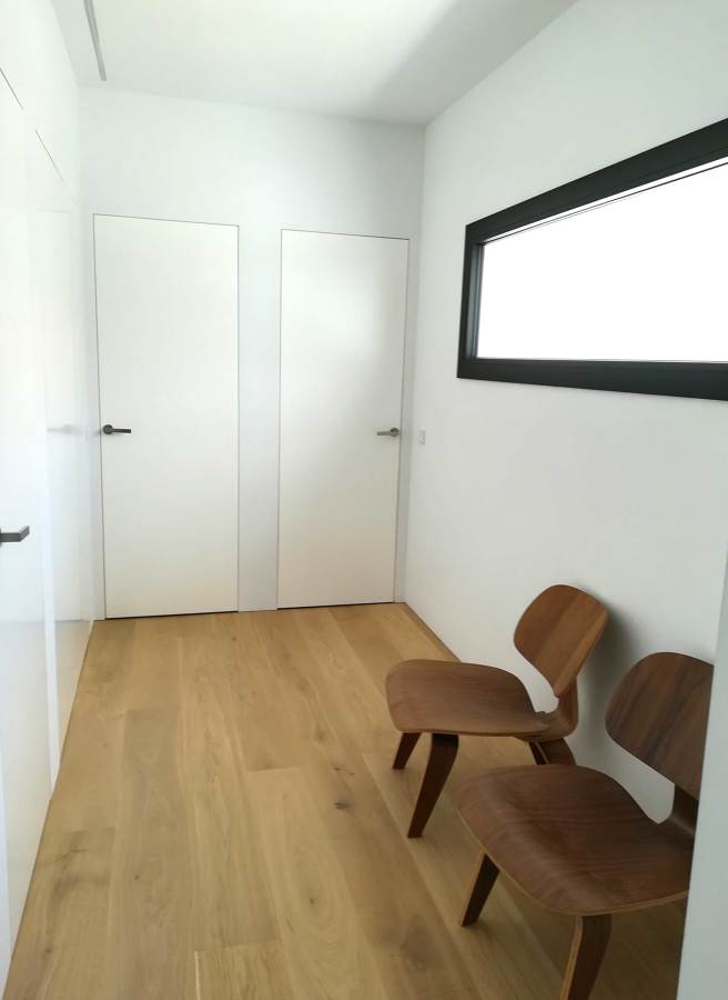 Distribuidor dormitorios baños