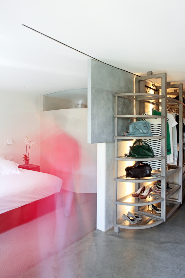 Dormitorio abierto al baño