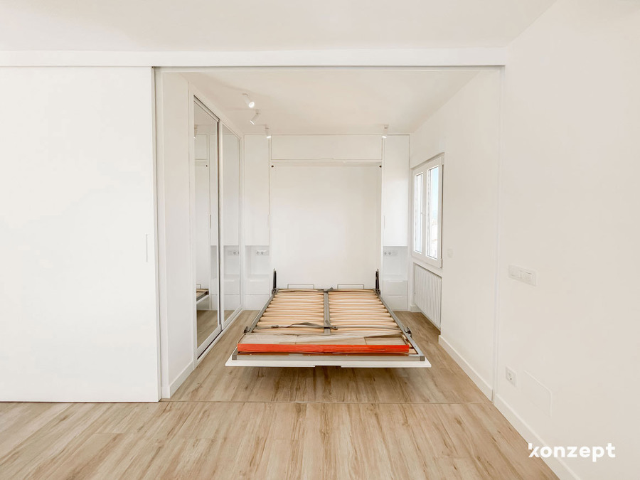 dormitorio cama abatible y cabecero integrado