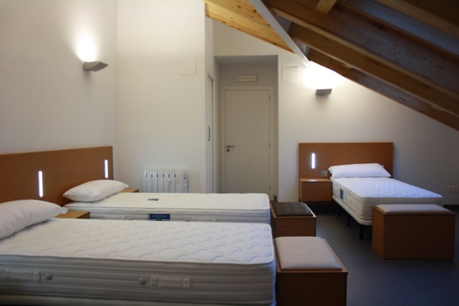 Dormitorio común en Bajo Cubierta