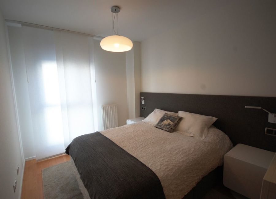 Dormitorio con vestidor