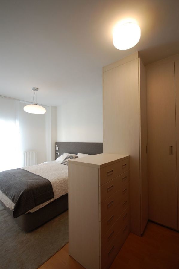 Dormitorio con vestidor