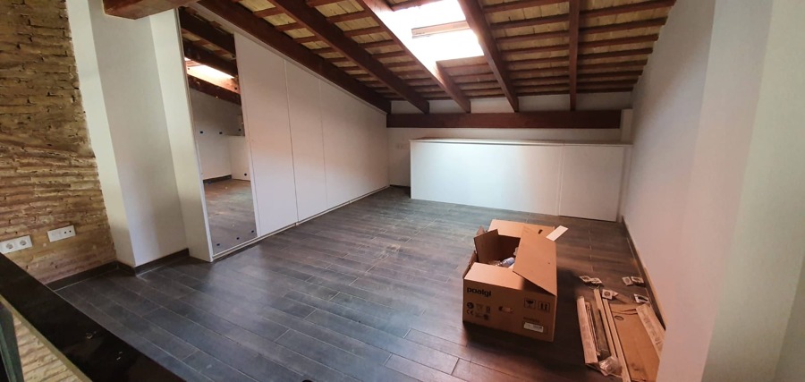 Dormitorio principal y tragaluz