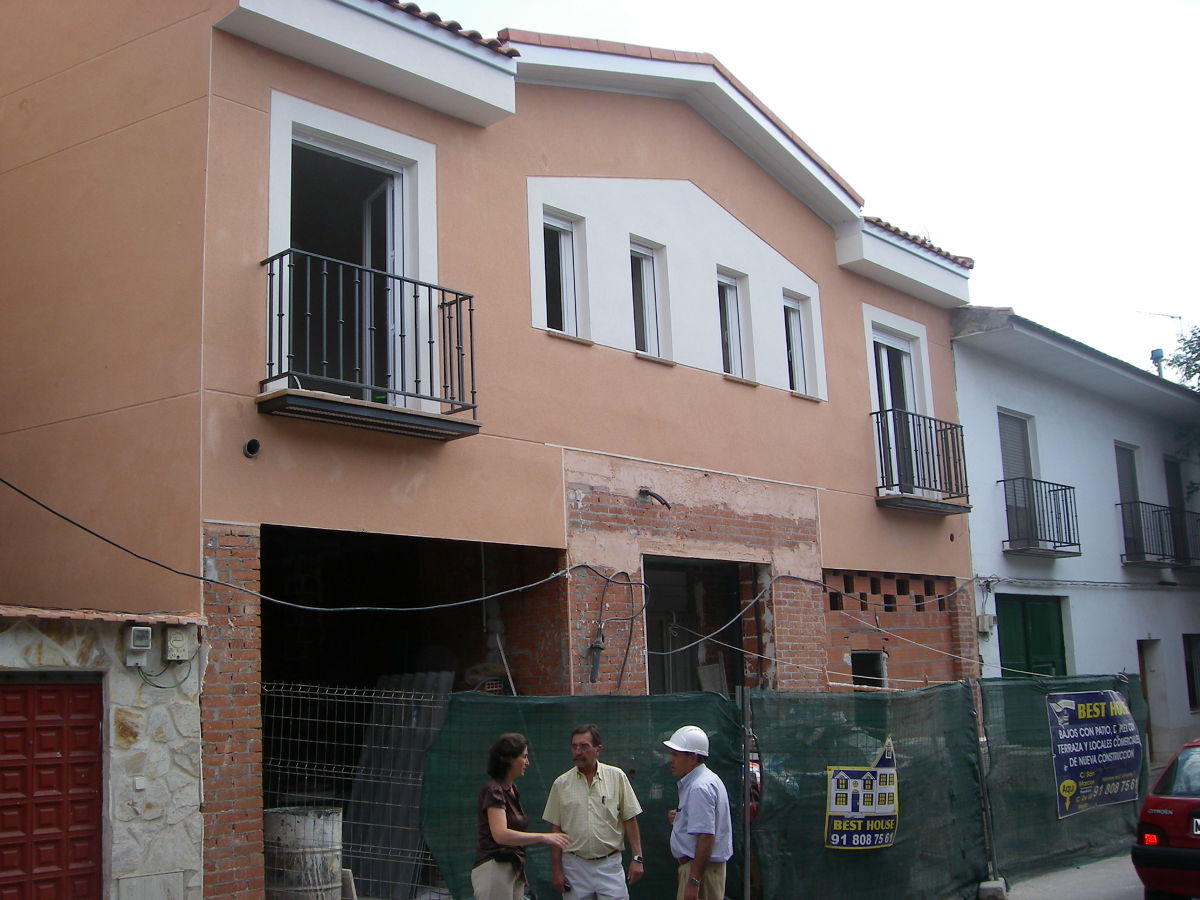 EDIFICIO DE VIVIENDAS Y LOCALES COMERCIALES
