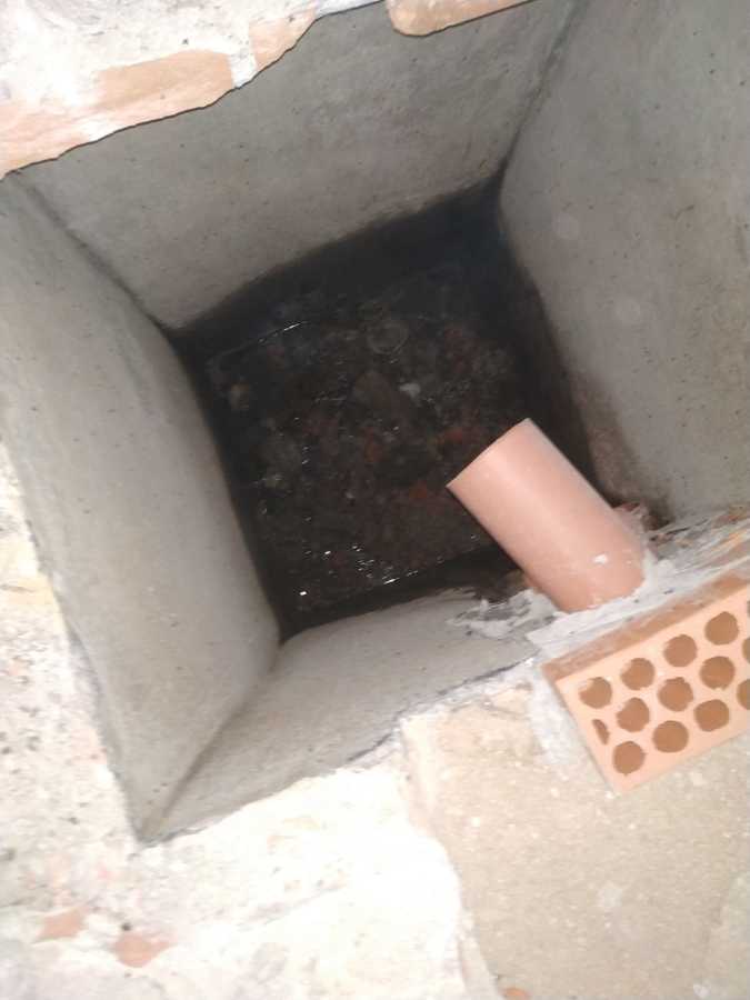 enfoscado de arqueta y nuevo tubo para desaguar