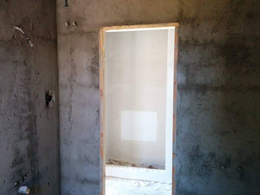 Enfoscado en baños y cocina.