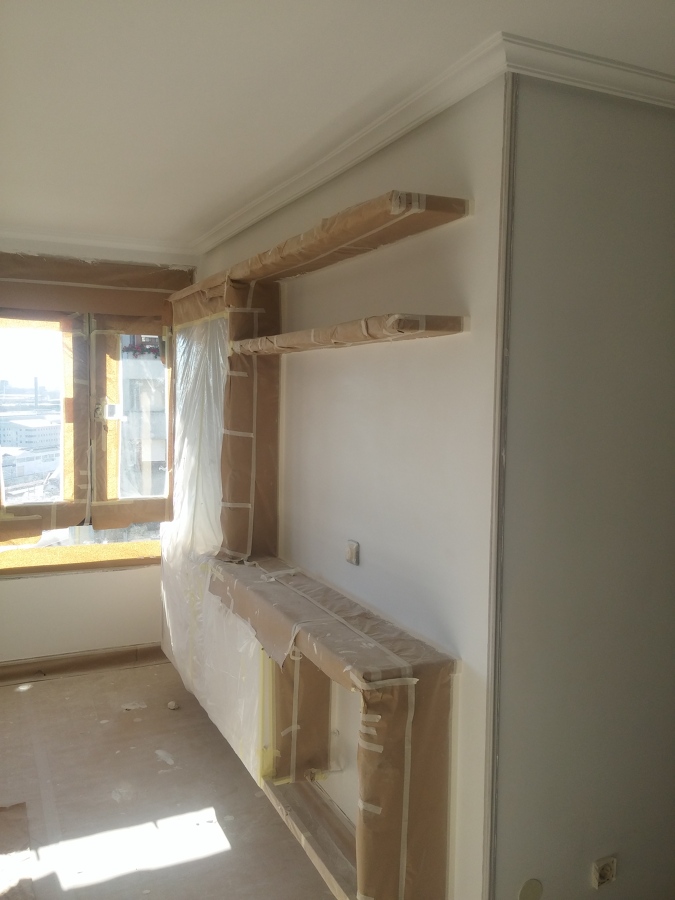 Enlucido de paredes/techos y pintado