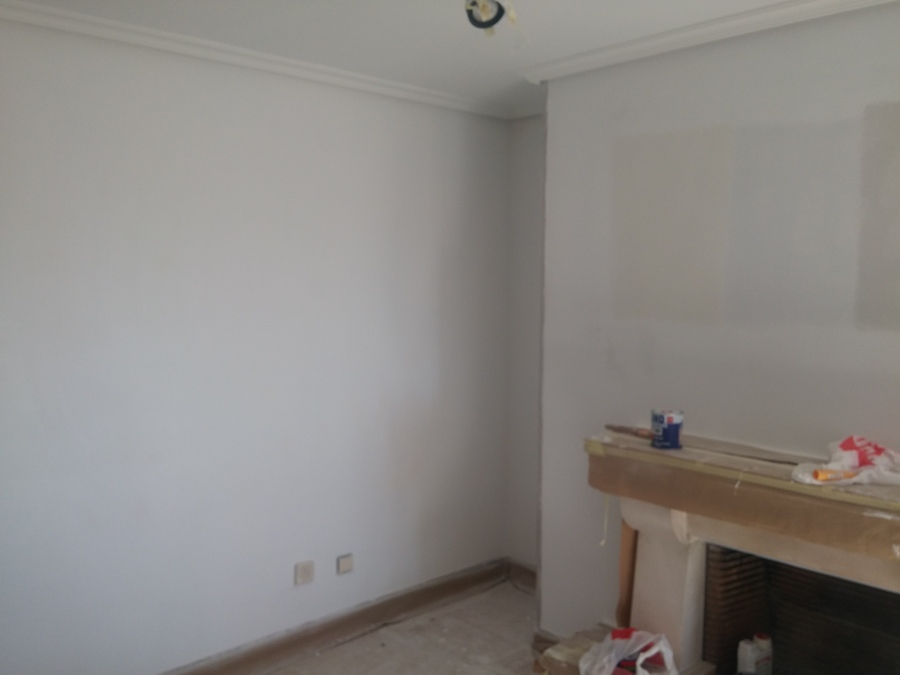 Enlucido de paredes/techos y pintado