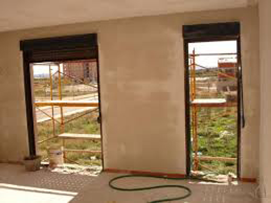 enlucidos y guarnecidos de yeso con perlita