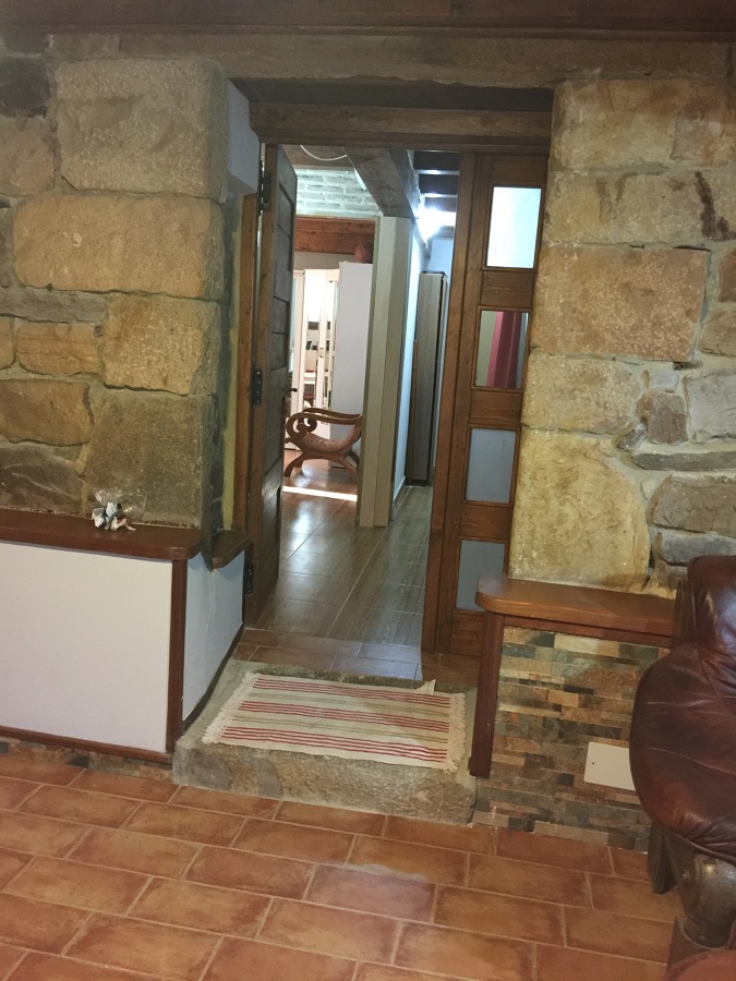 Entrada estancia sótano