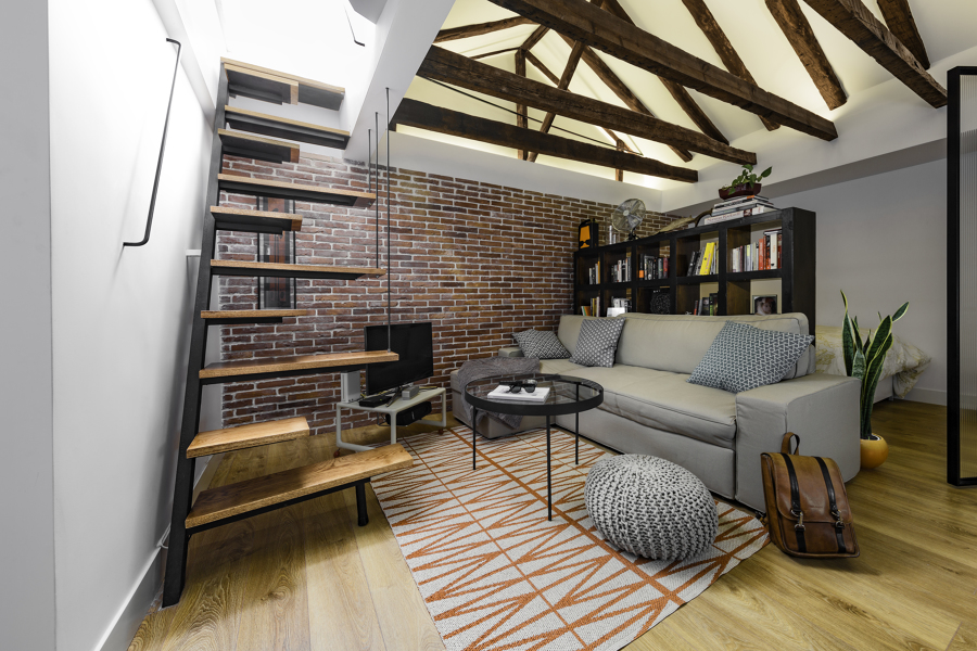 Estado reformado del espacio principal y dormitorio