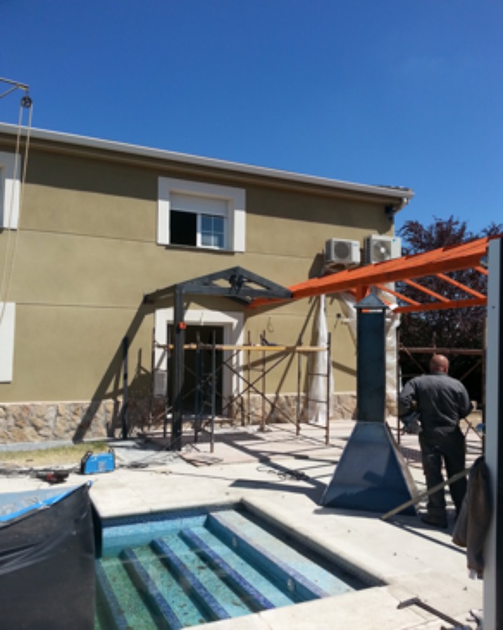 Estructura metálica miniada y pintada oxiron