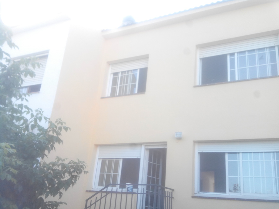 Fachada Adosada parte trasera Pintada.