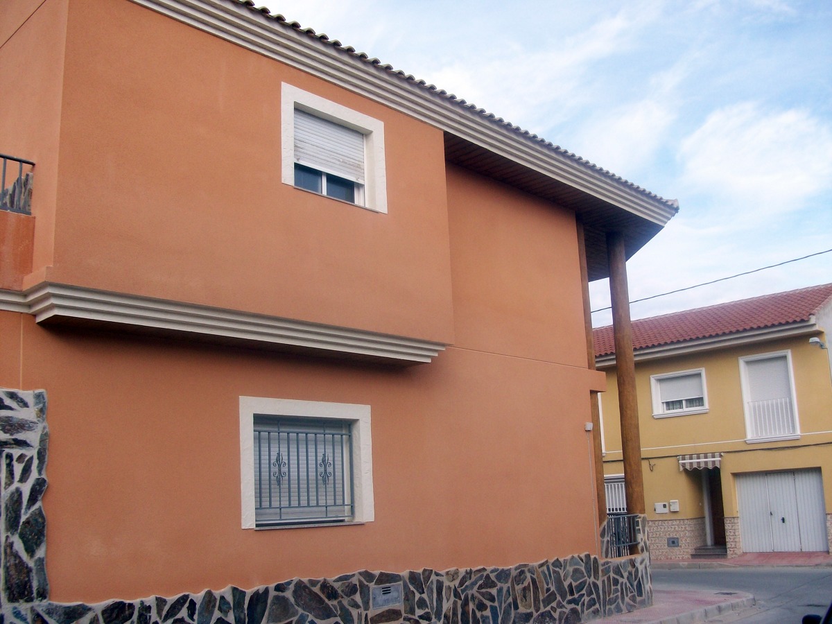 fachada raspado naranja