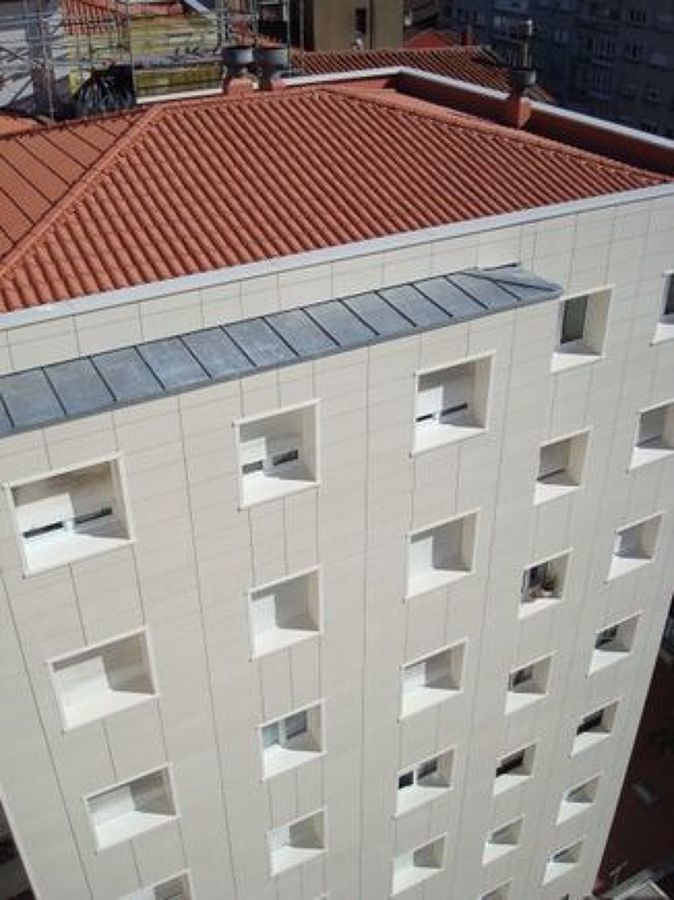 Fachada ventilada en patio