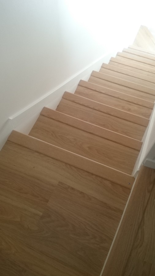 Forrado de escalera, con zanquines.