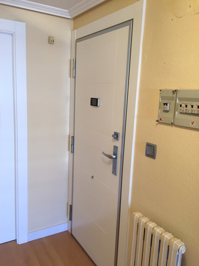 FORRADO DE PUERTA ACORAZADA