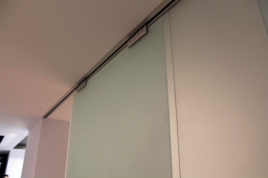 Guías de puerta corredera