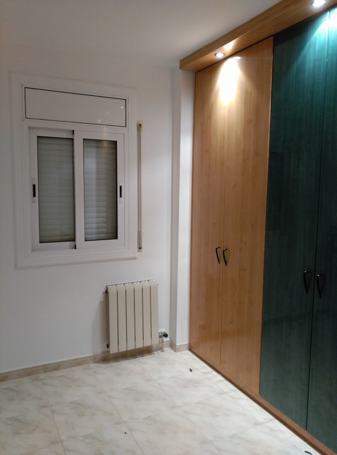 Habitación con vestidor