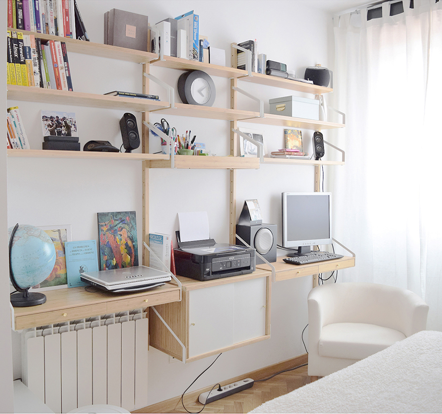 Habitación de invitados con zona de trabajo