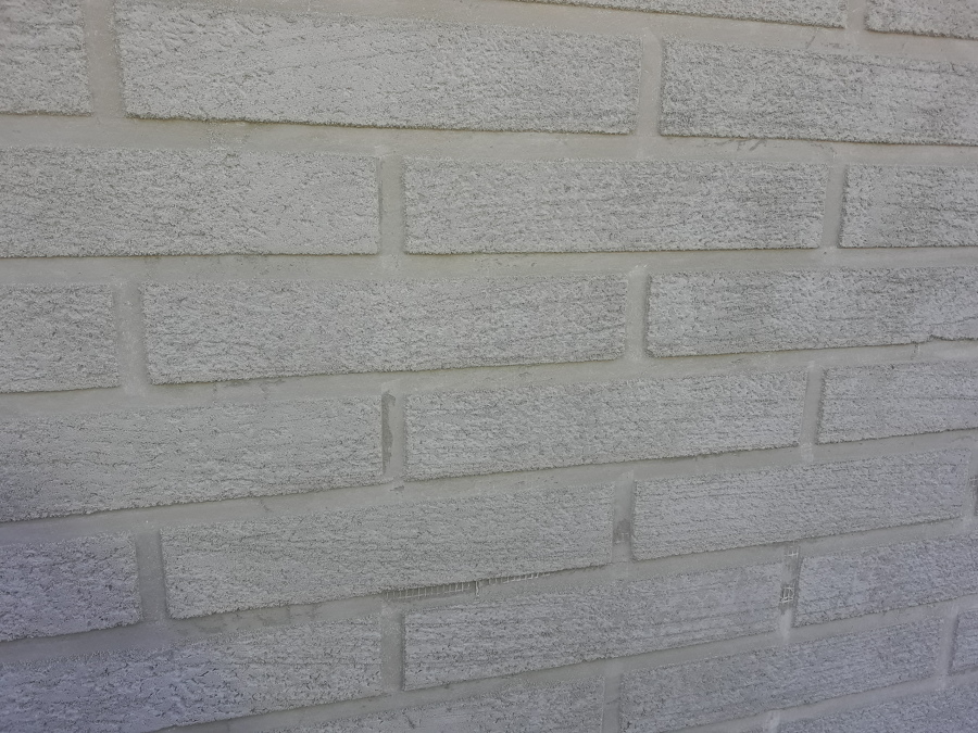 imitación obra vista en muro