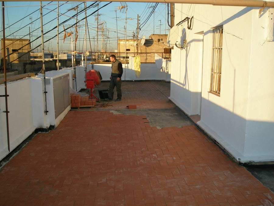 impermeabilizan de la terrasa comunitaria sobre el piso