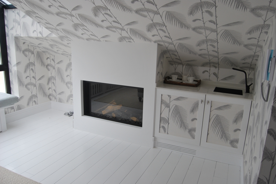 INTEGRACIÓN CHIMENEA Y MUEBLE ATICO